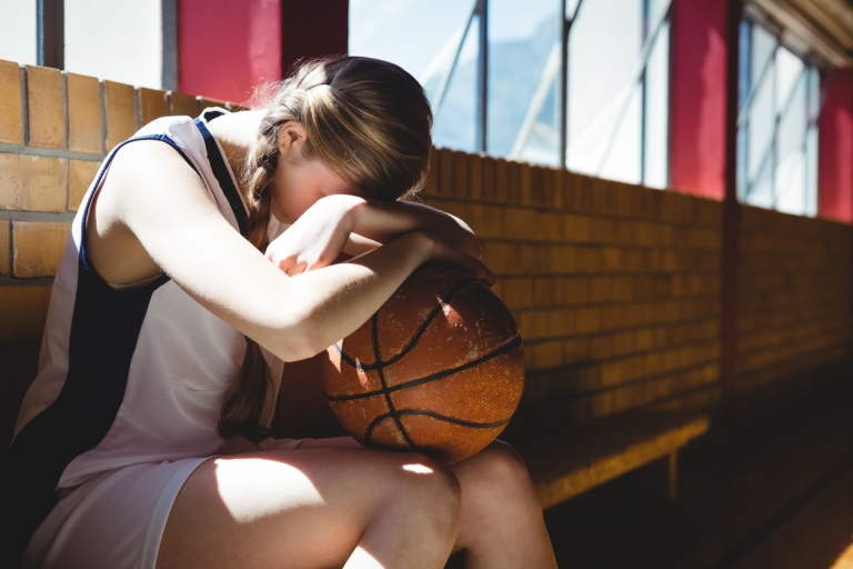 tired female basketball player