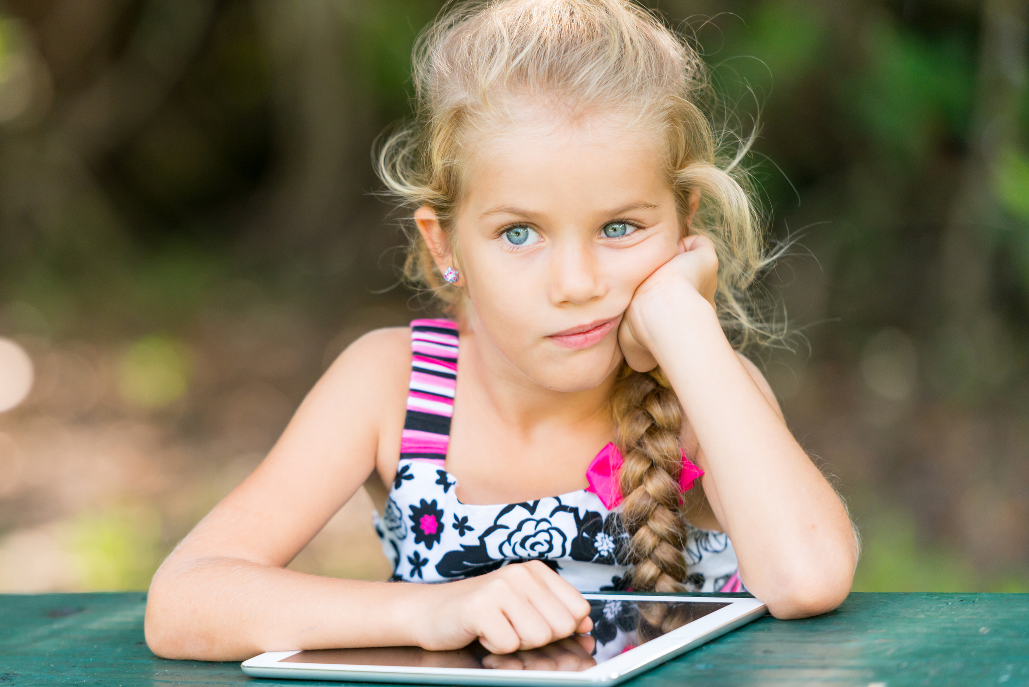 little girl staring blankly