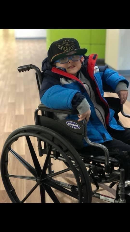 Levi in a wheelchair