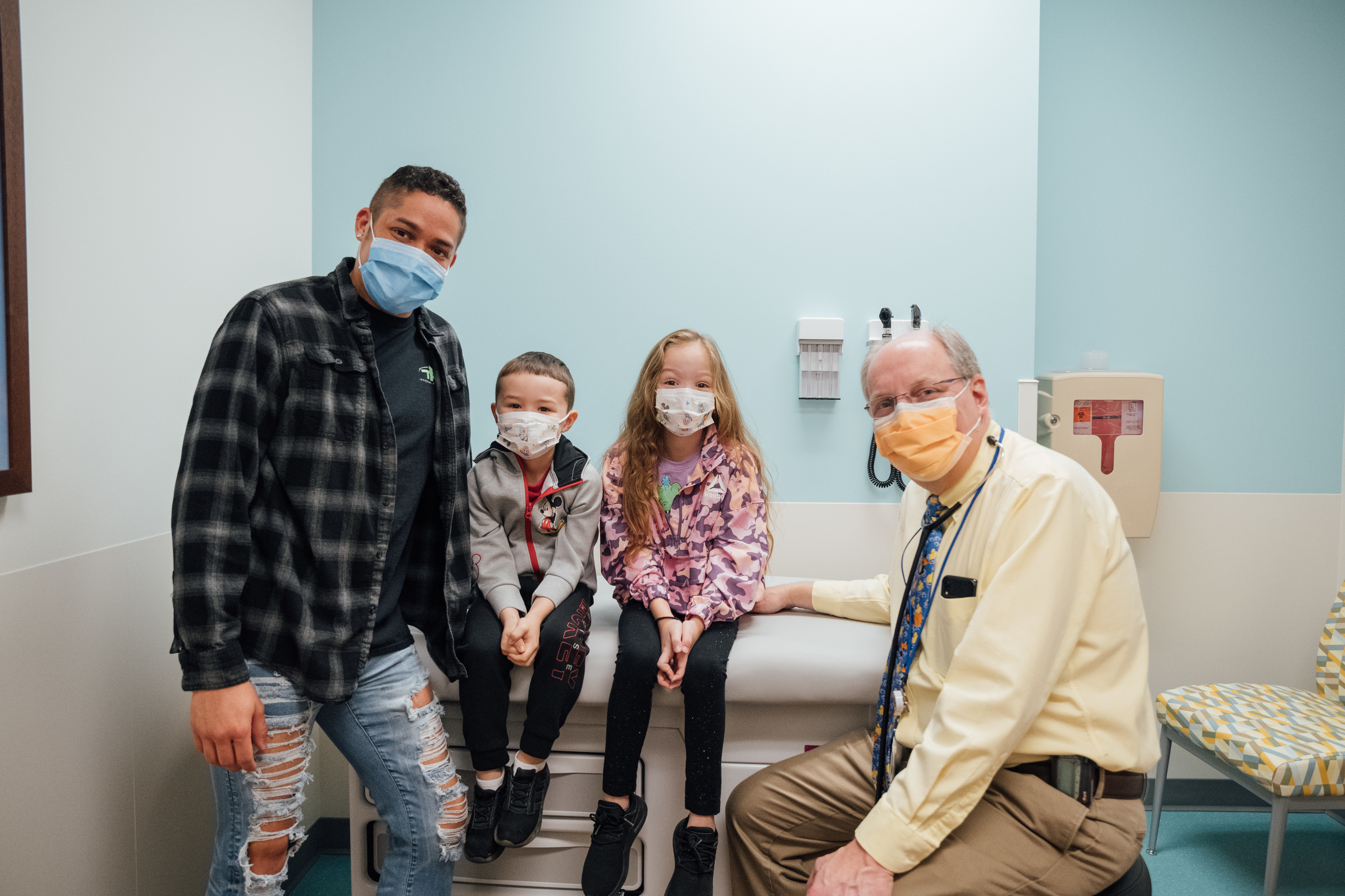 Dr. Bates with family on first day of new specialty care center