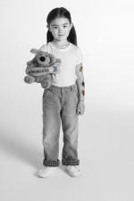 little girl holding a teddy bear