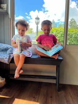 babies reading their Imagination Library books