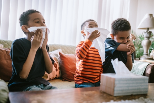 African american children sneezing
