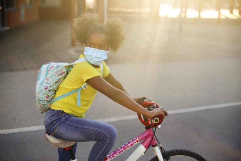 African American, riding bike to school 