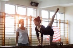 GIrl Practicing Gymnastics.